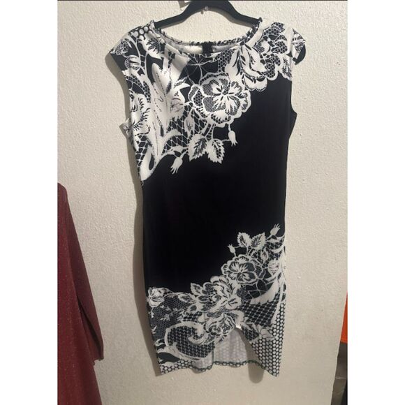 104 Elegant Black & White Floral Print Midi Dress with Asymmetrical Hem - Picture 2 of 3